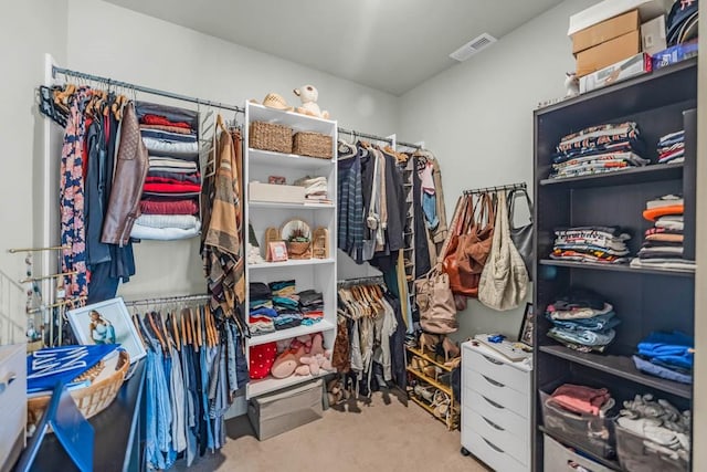 spacious closet featuring carpet and visible vents