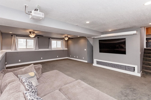 unfurnished living room with a textured ceiling, recessed lighting, baseboards, stairway, and carpet