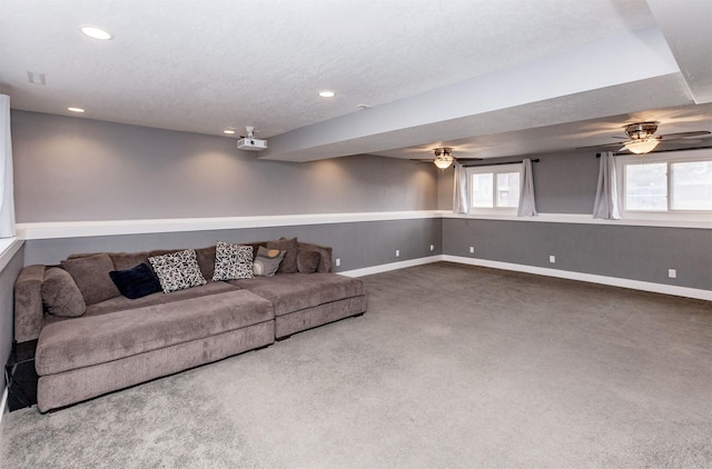 living room with baseboards, dark carpet, a textured ceiling, and recessed lighting