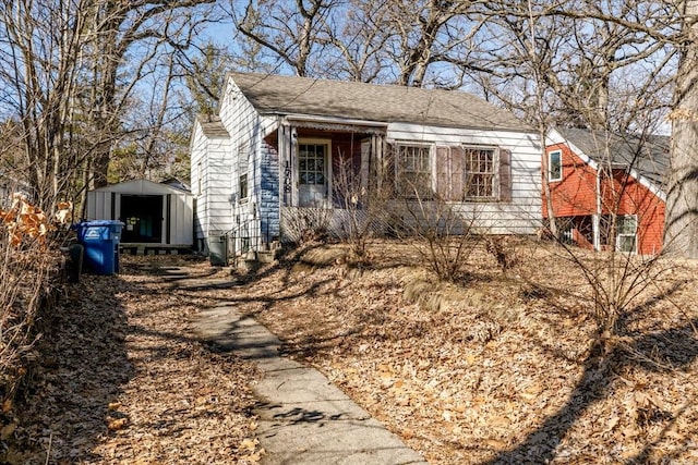 bungalow with an outbuilding and a storage unit