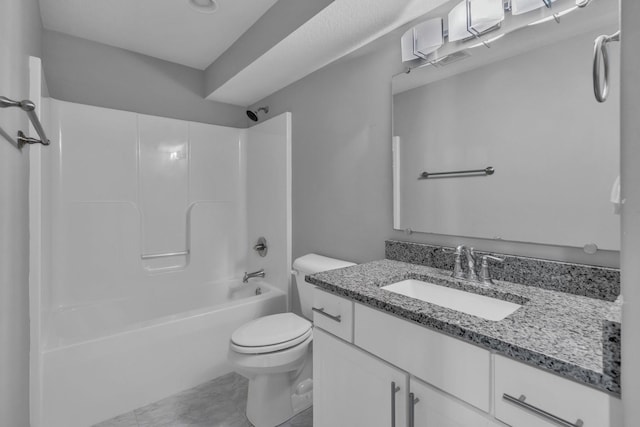 full bath featuring  shower combination, vanity, and toilet