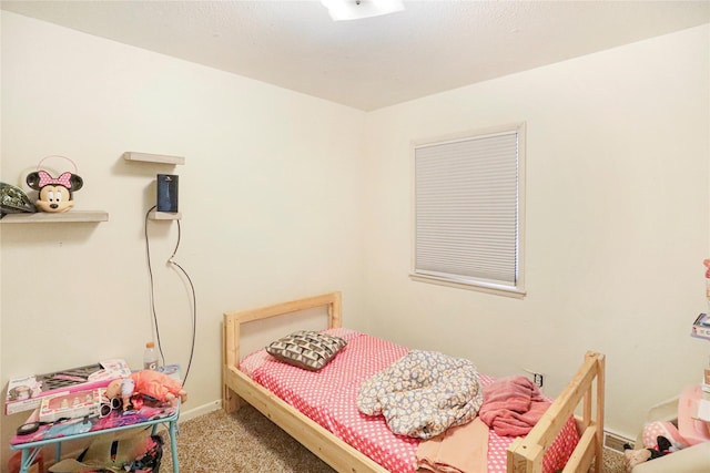 bedroom featuring carpet