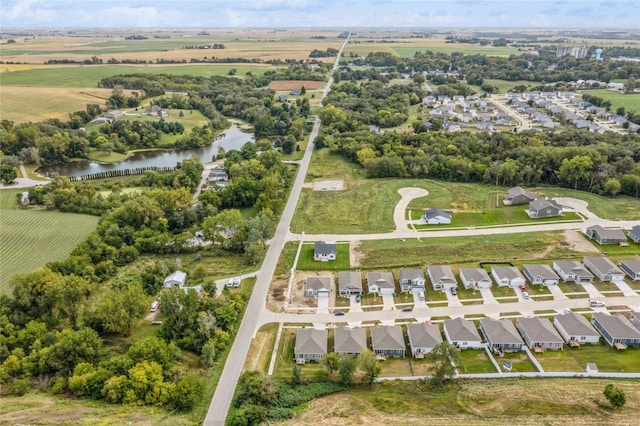 aerial view featuring a residential view and a water view