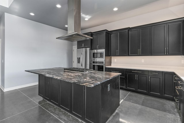 kitchen with stainless steel appliances, a center island, dark cabinetry, and island range hood