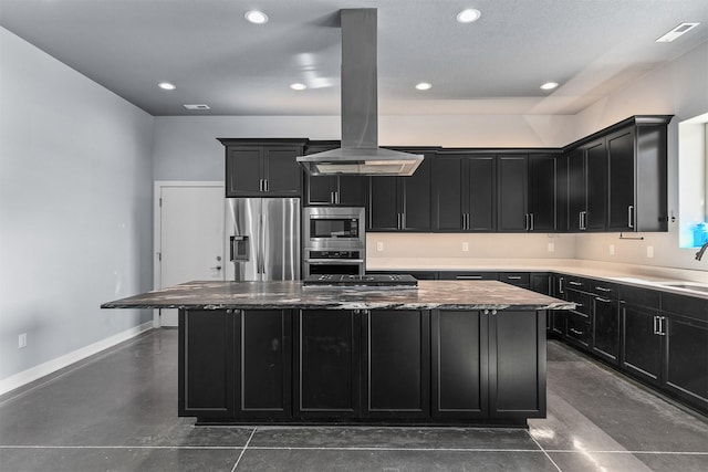 kitchen with dark cabinets, a center island, stainless steel appliances, and island range hood