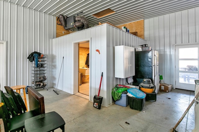 garage featuring metal wall