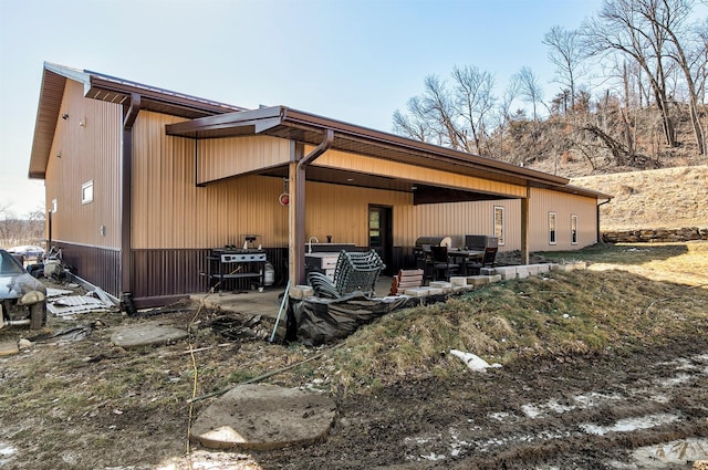 view of home's exterior with a patio