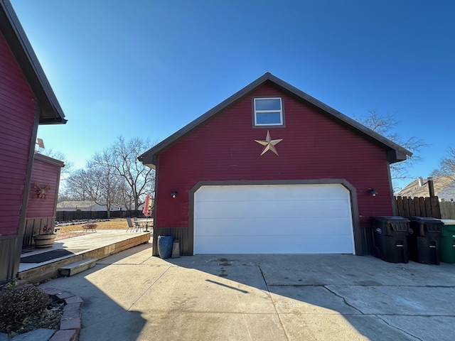 detached garage with fence