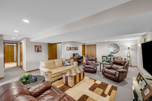 living area featuring a textured ceiling, recessed lighting, baseboards, and light colored carpet