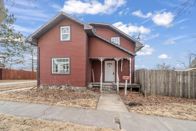 view of front of home with fence