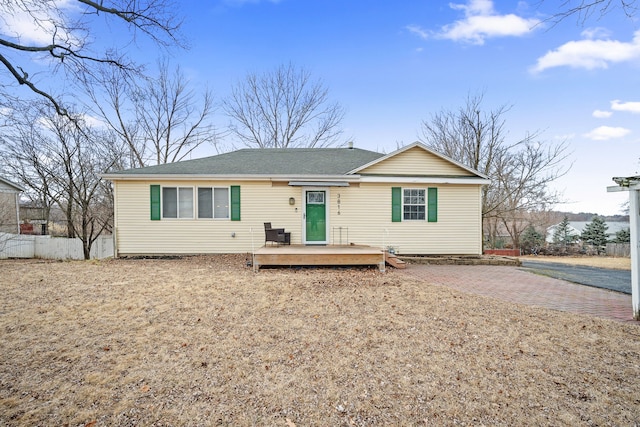 ranch-style house with a deck