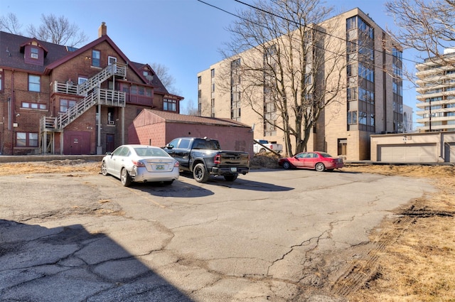 view of property with uncovered parking