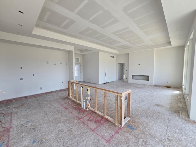 unfurnished living room featuring a fireplace