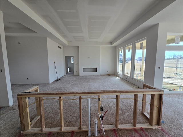 unfurnished living room featuring a fireplace