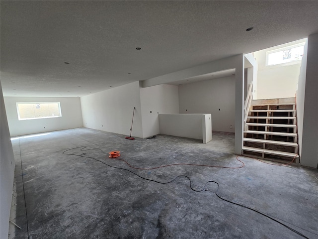 empty room with a textured ceiling