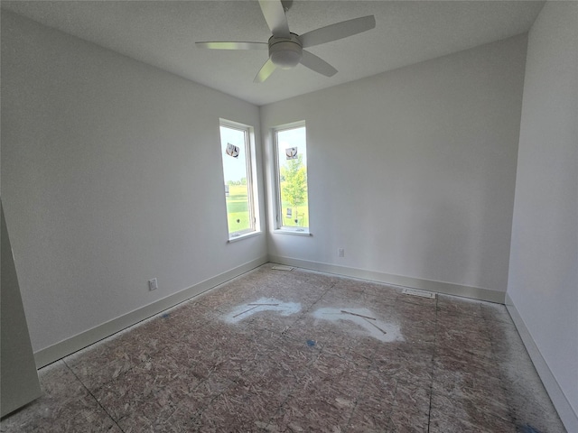 4732 162nd St, Urbandale, IA 50323 - unfurnished room with a ceiling fan and baseboards