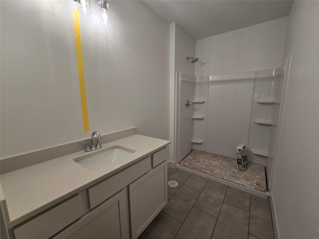 4732 162nd St, Urbandale, IA 50323 - full bath featuring a shower, tile patterned flooring, and vanity