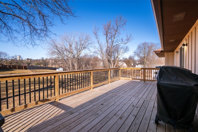 deck featuring fence and grilling area