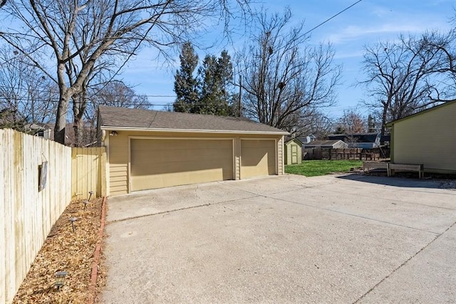 detached garage with fence