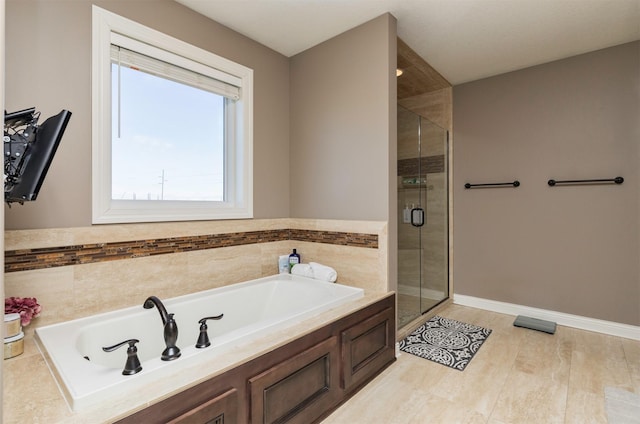 14201 Brookview Dr, Urbandale, IA 50323 - bathroom with a shower stall and a bath