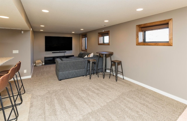 14201 Brookview Dr, Urbandale, IA 50323 - carpeted living room with recessed lighting and baseboards