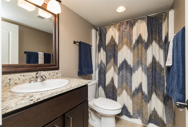14201 Brookview Dr, Urbandale, IA 50323 - bathroom featuring toilet, vanity, and curtained shower