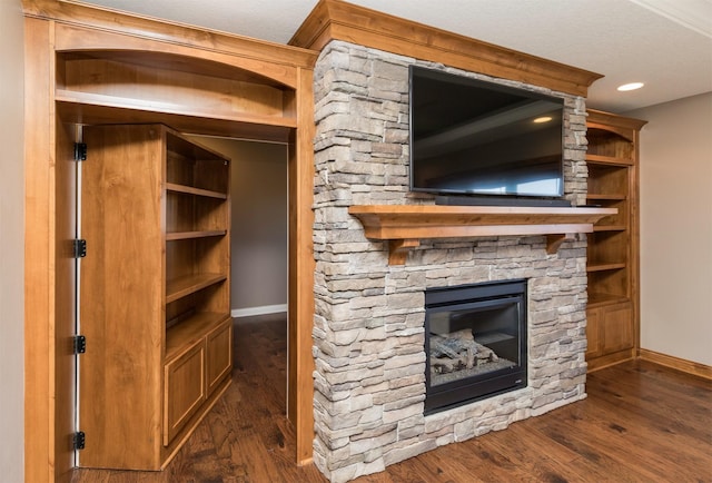 14201 Brookview Dr, Urbandale, IA 50323 - unfurnished living room with baseboards, a fireplace, dark wood-type flooring, and recessed lighting