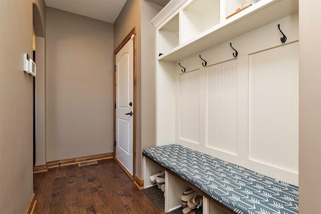 14201 Brookview Dr, Urbandale, IA 50323 - mudroom with dark wood finished floors and baseboards