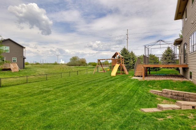 14201 Brookview Dr, Urbandale, IA 50323 - view of yard featuring a playground and a deck