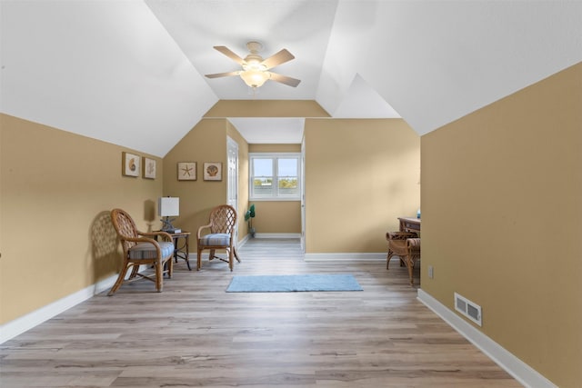 1905 W Olive St, Marshalltown, IA 50158 - living area featuring ceiling fan, baseboards, light wood-type flooring, and lofted ceiling