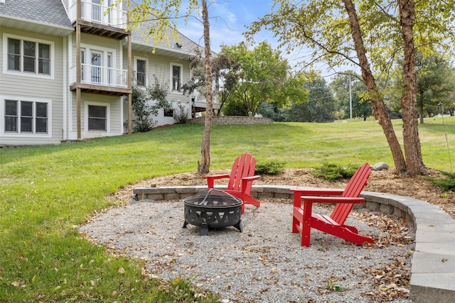 1905 W Olive St, Marshalltown, IA 50158 - view of green lawn featuring a fire pit