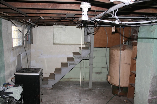 below grade area featuring stairs and electric panel