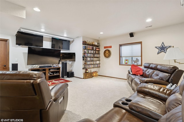 living room with carpet, baseboards, and recessed lighting