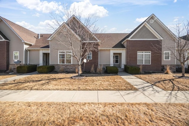 view of front of house featuring brick siding