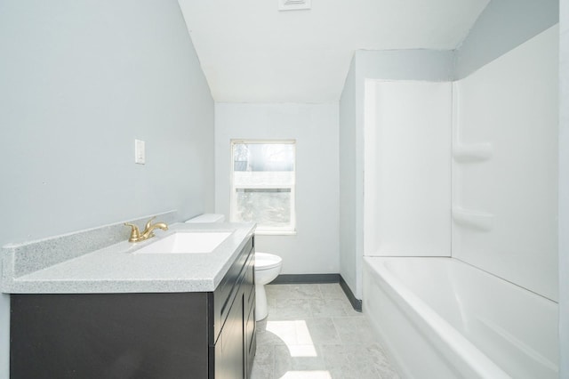 full bath with baseboards, vanity, toilet, and tile patterned floors