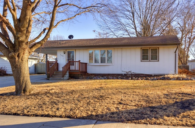 ranch-style house with a carport