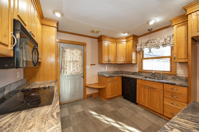 kitchen with a sink, visible vents, black appliances, dark countertops, and crown molding