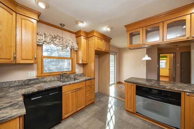 kitchen with oven, a sink, black dishwasher, hanging light fixtures, and glass insert cabinets