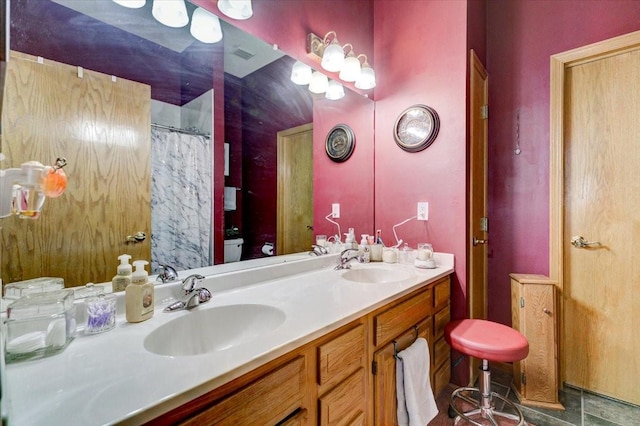 2801 Ep True Pkwy Unit 1005, West Des Moines, IA 50265 - bathroom featuring a sink, visible vents, toilet, and double vanity