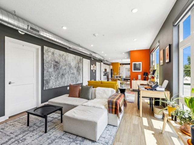 450 SW 7th St Unit 210, Des Moines, IA 50309 - living area with light wood-type flooring and recessed lighting