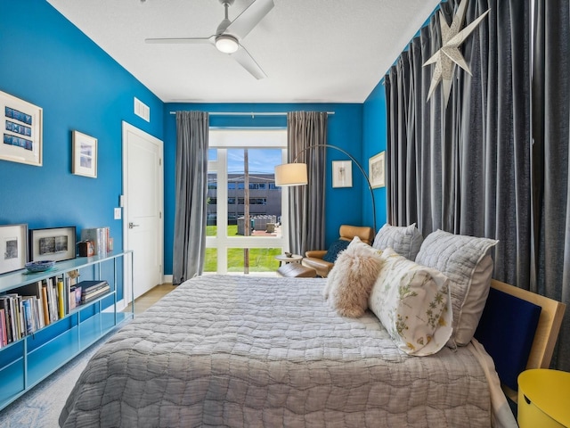 450 SW 7th St Unit 210, Des Moines, IA 50309 - bedroom with ceiling fan