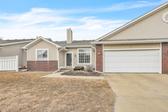 ranch-style house with driveway, a chimney, fence, and brick siding