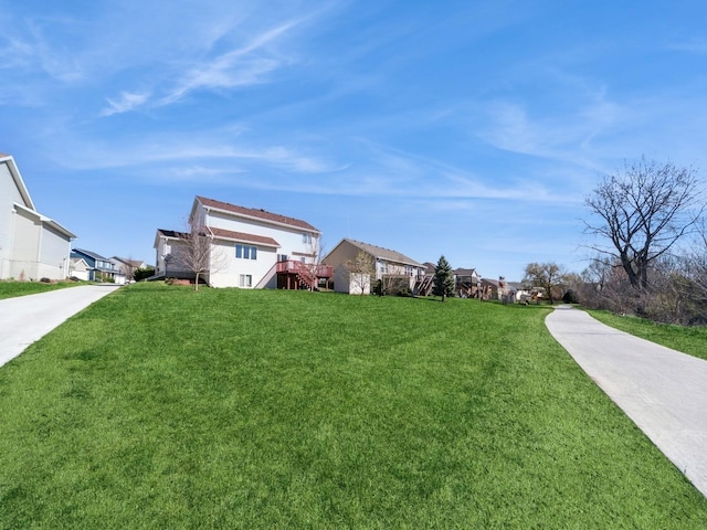 604 NW 8th St, Grimes, IA 50111 - view of yard with a residential view and stairs
