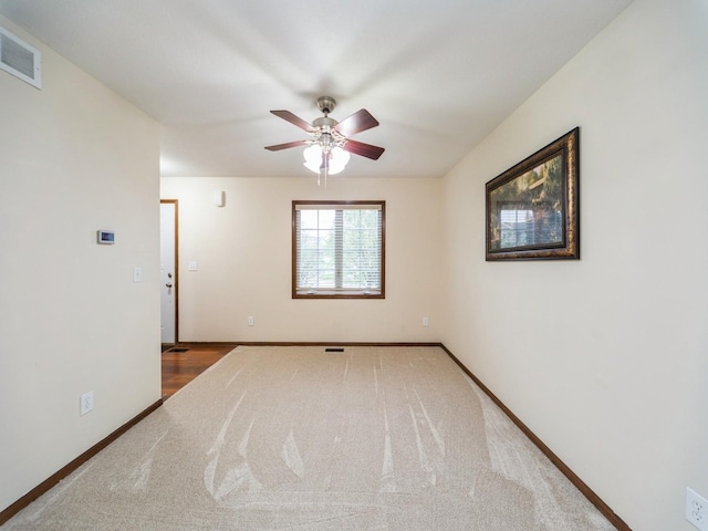 604 NW 8th St, Grimes, IA 50111 - carpeted empty room with visible vents, baseboards, and ceiling fan