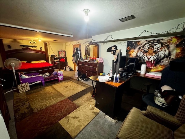 bedroom with a textured ceiling