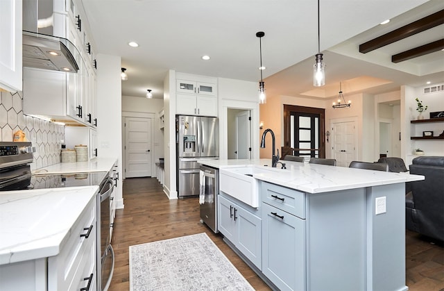 5021 148th Cir, Urbandale, IA 50323 - kitchen with stainless steel appliances, wall chimney exhaust hood, backsplash, dark wood-style flooring, and recessed lighting
