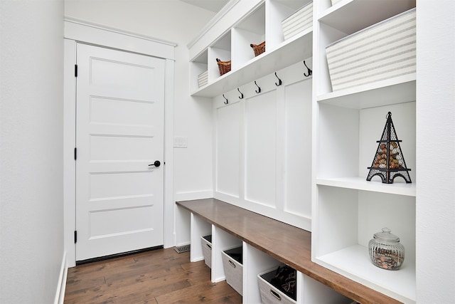 mudroom with dark wood-style flooring