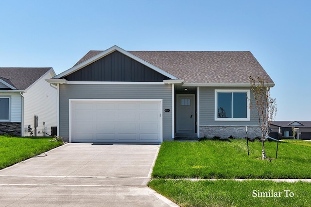 view of front of home featuring a garage, cooling unit, a front lawn, and board and batten siding