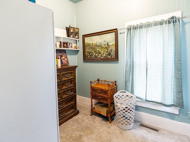 carpeted bedroom with visible vents