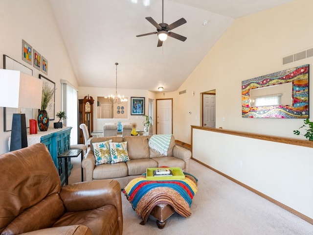 carpeted living room with high vaulted ceiling, visible vents, baseboards, and ceiling fan with notable chandelier